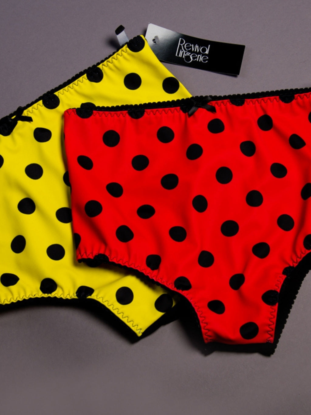 Red and Yellow polka dot knickers on a grey background