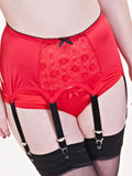 red lace supsender belt and black stockings on a white background